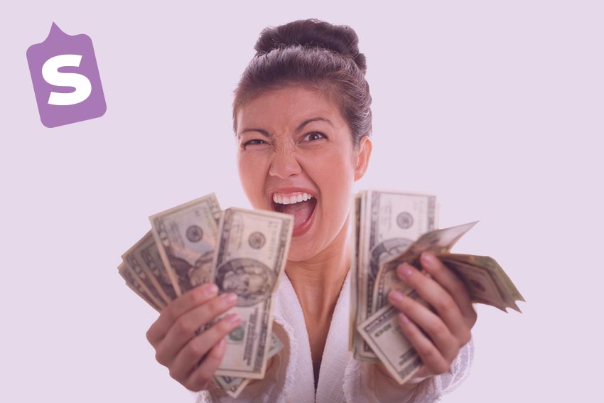 Excited Woman Holding Cash